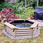 100-gallon Norlog pond with landscaping and plants