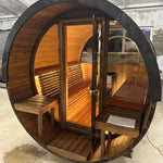 Wooden barrel sauna with bench seating