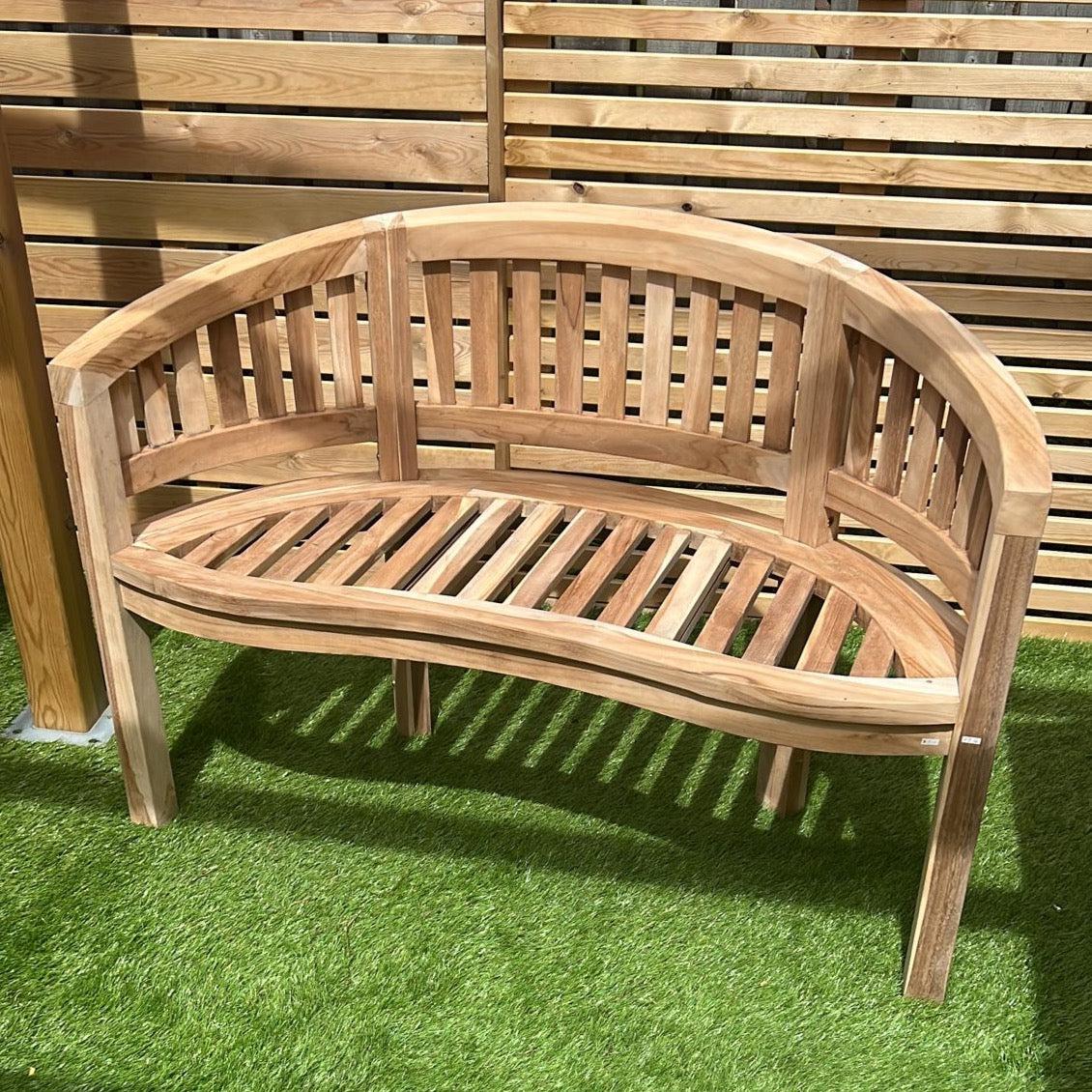 Solid Teak Curved Banana Bench for two persons.