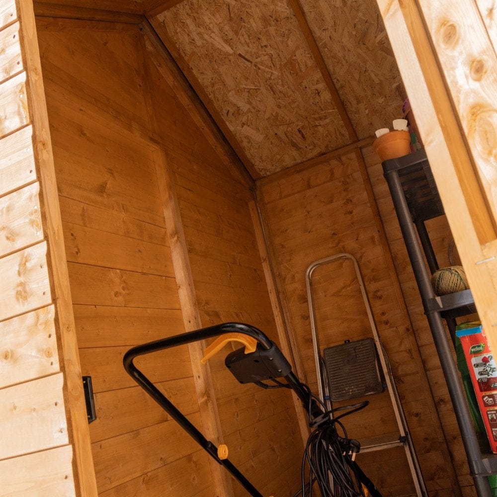 Interior of 12x6 growhouse with storage
