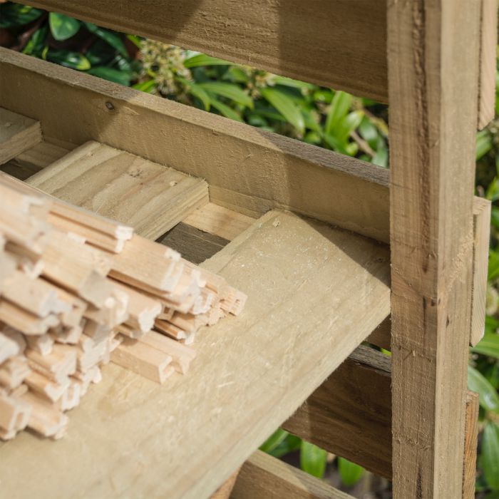 Narrow log store with kindling shelf, tanalised timber