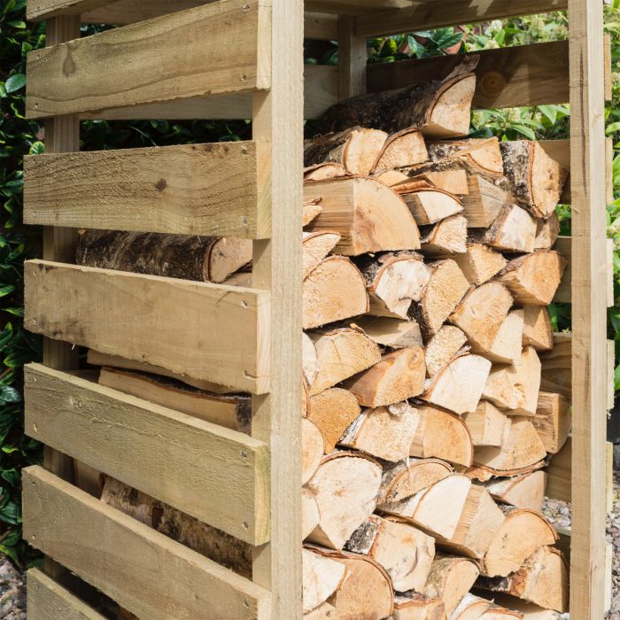 Narrow log store with kindling shelf, tanalised timber