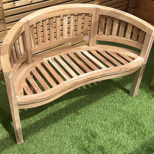Solid Teak Curved Banana Bench for two persons.