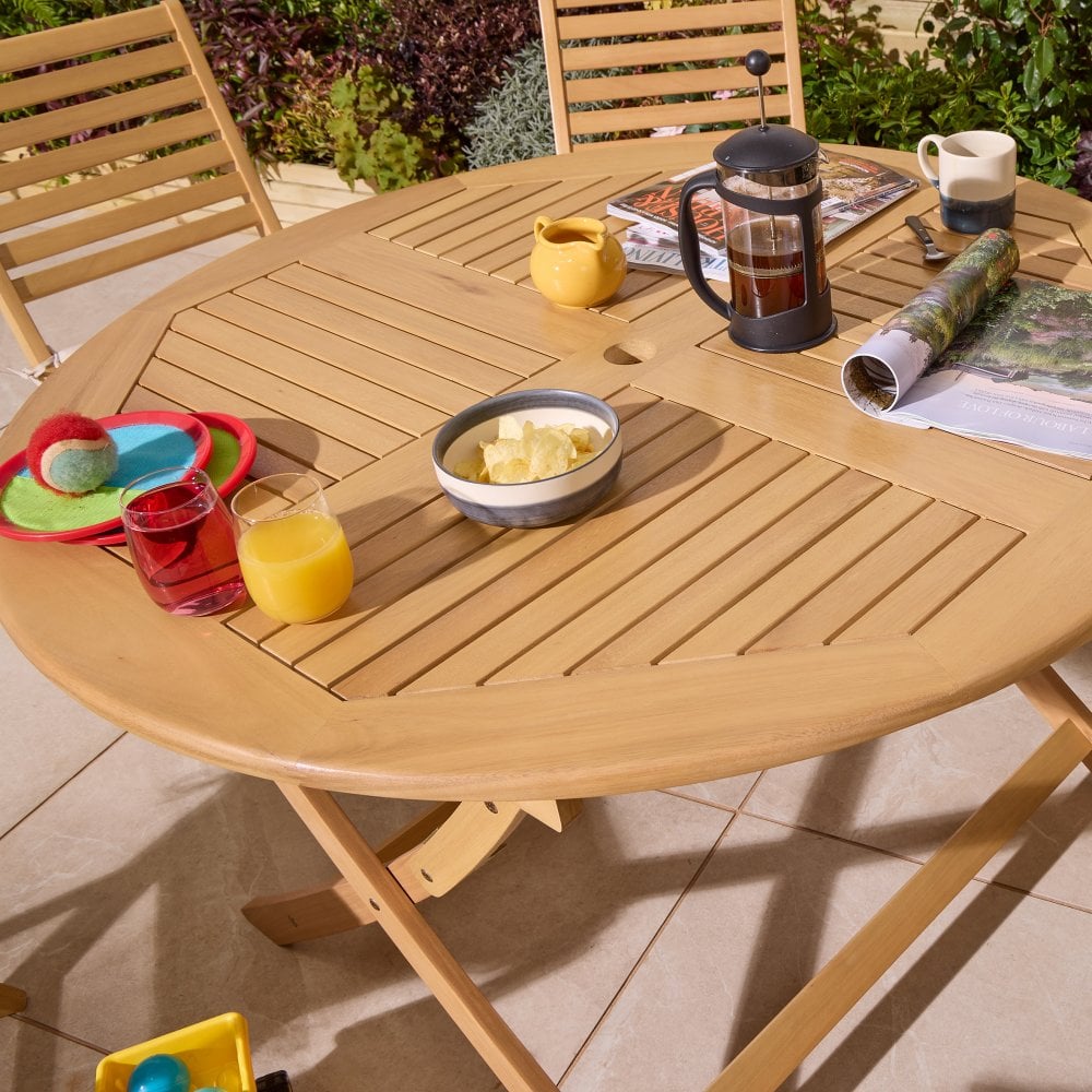 Folding 6 Seat Round Dining Set With Cushions