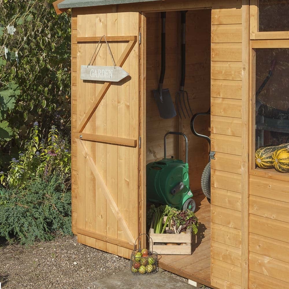 Potting shed with garden tools and produce