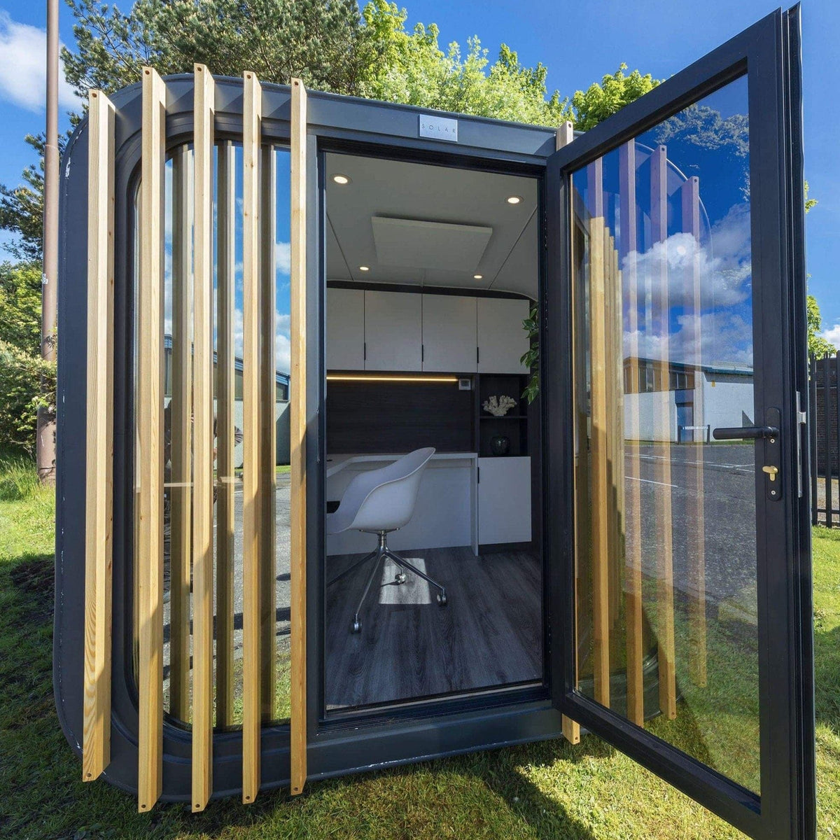 Stand-Alone, Solar Garden Office Pod, complete with desk and storage